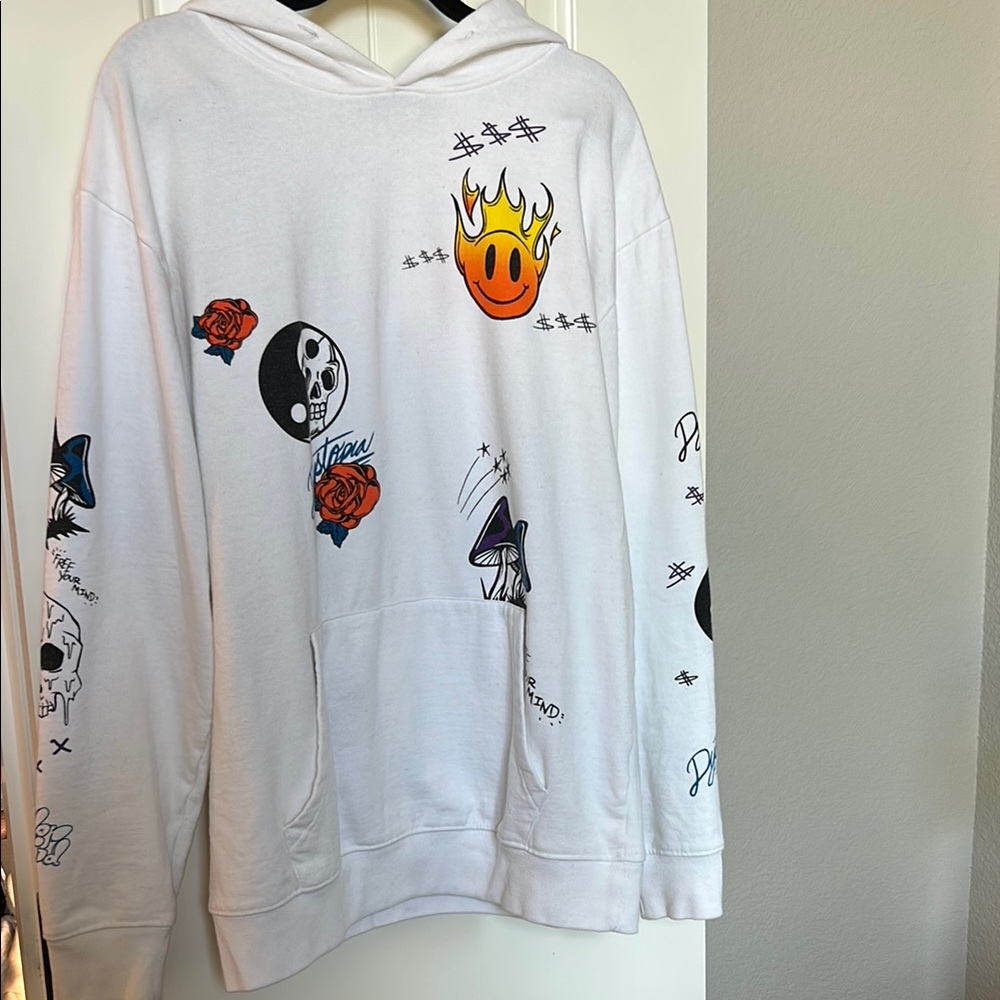 White Sweatshirt with Graphic Designs